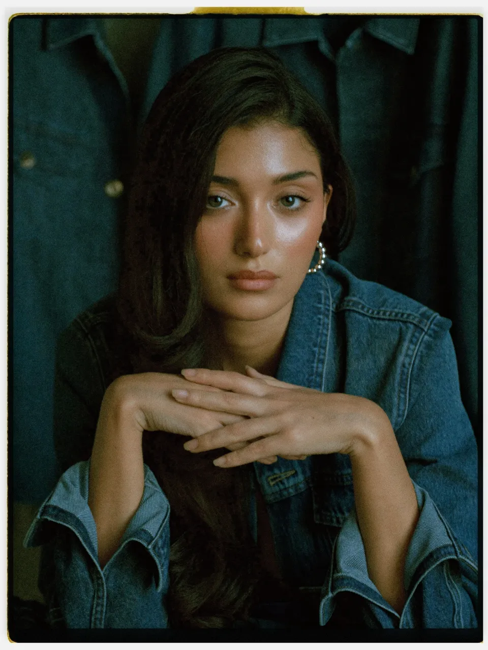 Aurex 400 film stock in Chromogen, a versatile consumer negative: a studio portrait in a denim jacket on an instant-style print
