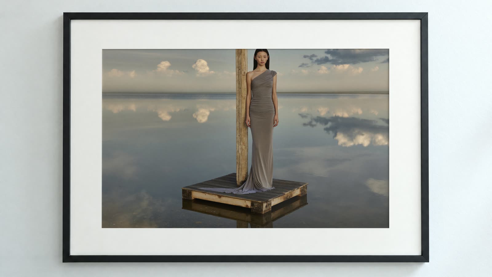 Chromogen mockup: the photo in a black frame with a white mat on a gallery wall
