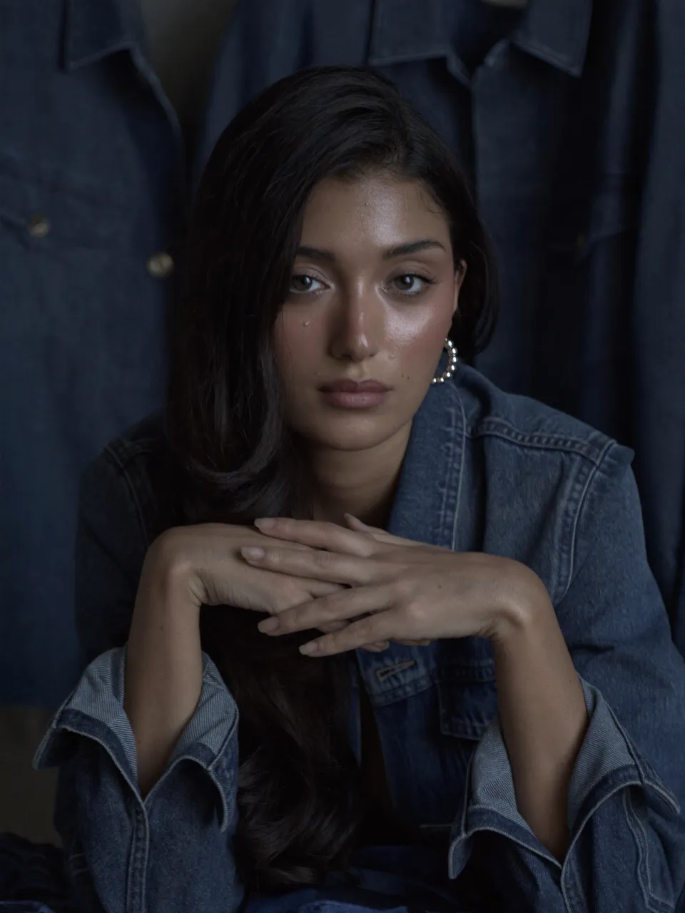 The original unedited photo before any Chromogen film stock: a studio portrait in a denim jacket