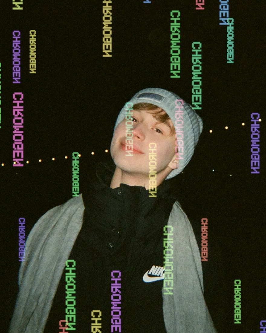 The same photo pre-exposed with the word Chromogen in coloured type